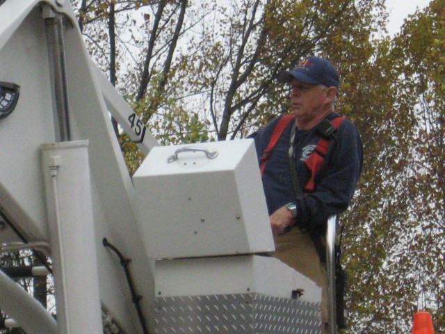 Dave Vining operating Ladder 21 at a building fire.